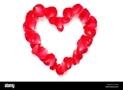 Red Rose Petals Arranged Into A Heart Shape With Copy Space In The