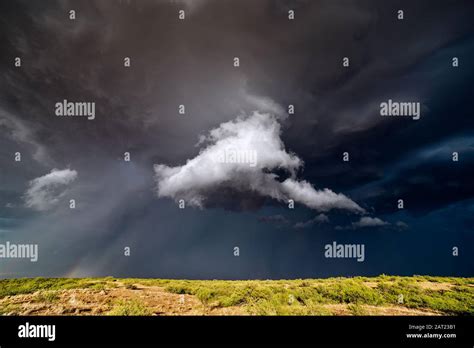 Scenic Landscape With Ominous Dark Storm Clouds In The Sky From A
