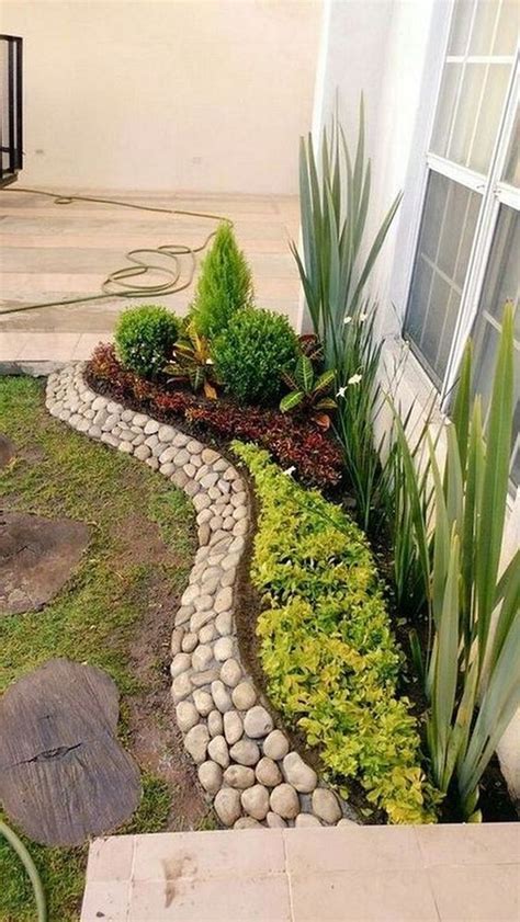 Rocks are a great low maintenance ground cover, that when done right look great. 25 Beautiful Front Yard Rock Garden Landscaping Design Ideas ~ GODIYGO.COM