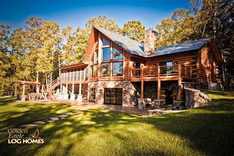 Hillside walkout designs are great for sloping lots and often will feature large windows are doors oriented to take advantage of a view. Golden Eagle Log Homes Home Cabin Photos Lakehouse - House ...