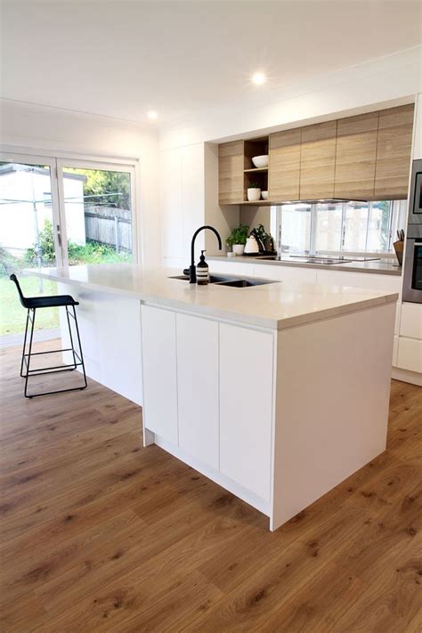 Polytec Doors In Natural Oak Ravine And Caesarstone Benchtop Calacatta