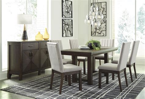 Four chairs are comfortably upholstered in faux leather for easy cleanups. Ashley Furniture Dellbeck D748-45+6X01+60 8 PC Table, 6 ...