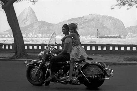 couple riding a motorcycle in rio de janeiro brazil 1963 vintage vintagestyle