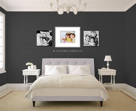Hanging a large frame over the bed creates a pleasant focal point. 2 20x20 canvases and one 16x20 print in 26x32 frame with ...