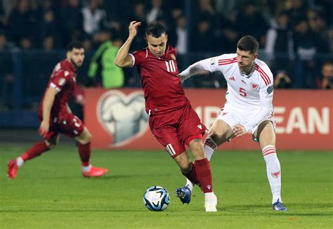 wales euro 2024 qualification hopes hit with draw in armenia reuters