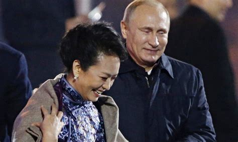 Vladimir Putins Shawl Gesture To Leaders Wife Covered Up By Chinese