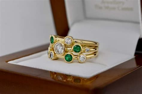 Archived Design 18ct Yellow Gold Multi Emerald And Diamond Bezel Set