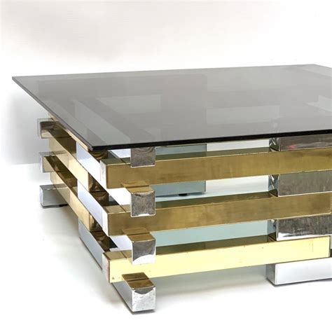 A unique coffee table from the 1970s, manufactured in france and designed in the style of famous designer pierre cardin! Pierre Cardin Midcentury Brass and Chrome French Coffee ...