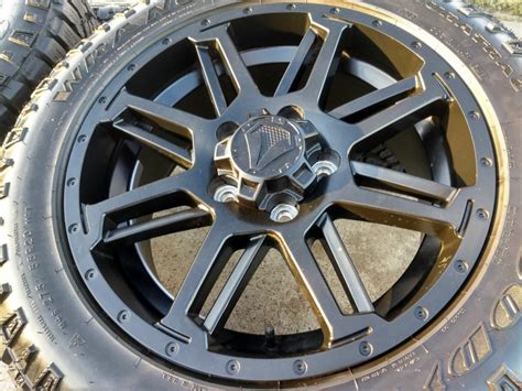 I think the bolt pattern is too close to try using a wheel adapter. 20" Toyota Tundra TSS 2019 OEM wheels