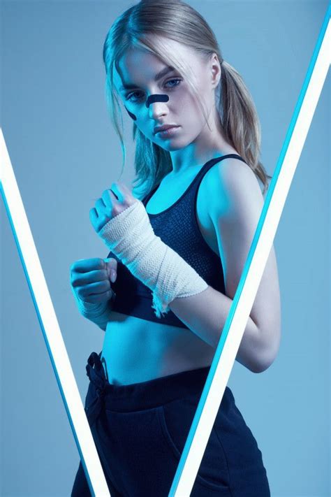 Strong Beautiful Girl With Blonde Hair Confident Look Fists In Protective Boxing Bandages