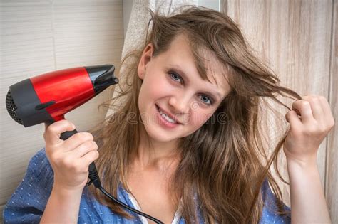 Fashion Girl With Hair Dryer Dries Her Hair Stock Image Image Of