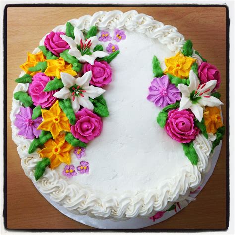 The ultimate guide to 18. Buttercream basket weave cake with royal icing flowers ...