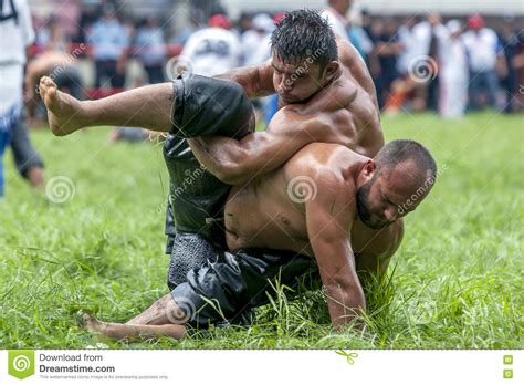 A Wrestler Takes Control Of His Battle During Competition At The Kirkpinar Turkish Oil Wrestling