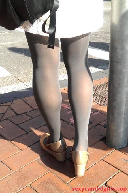 sexy candid girls legs in black pantyhose on city street candid photo item 1