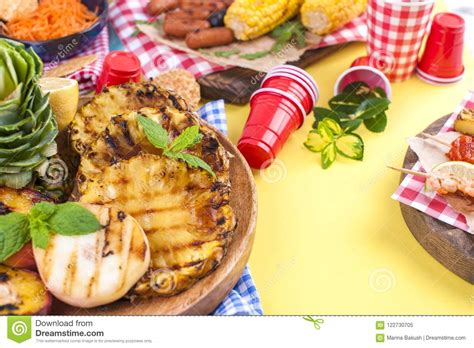 Picnic With Grilled Food Sausages And Corn On Barbecue Shrimp