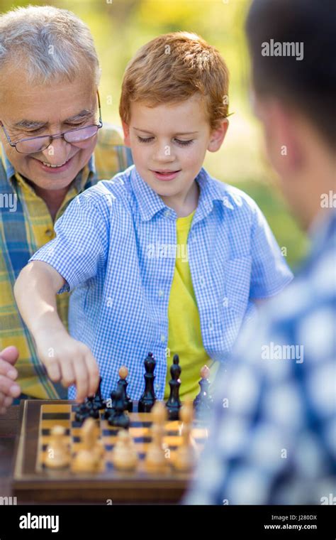 Boy Playing Chess Game At Park Stock Photo Alamy