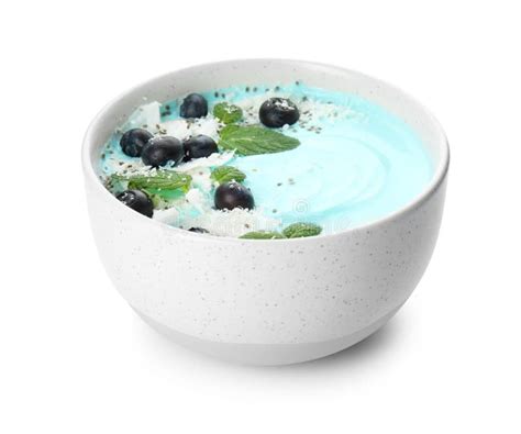 Bowl Of Spirulina Smoothie With Coconut Blueberries And Chia Seeds