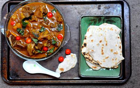 Bn Cuisine With Lohi Goat Curry And Roti Bellanaija