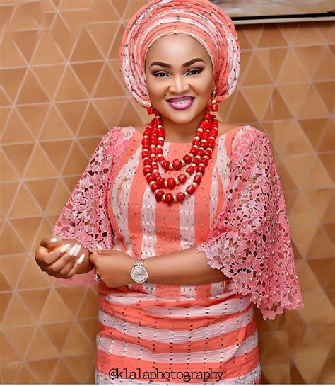 For latest african fashion, ankara, kitenge, african women dresses, bazin, african prints, african men's fashion, nigerian style, ghanaian fashion. Wow!! @klalaphotography w Coral and white Aso Oke mixed ...