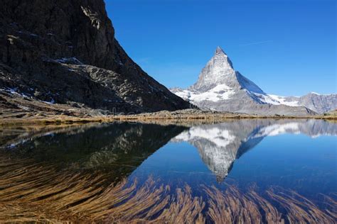 Matterhorn Reflection In The Blue Lake Stock Image Image Of Clear