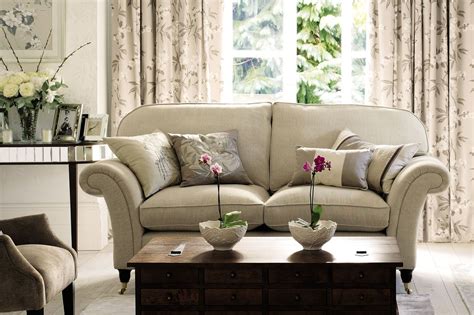 Laura ashley built a commercial empire upon romantic fabrics and a line of cleverly tweaked princess diana's love of laura ashley clothes inspired a generation of sloane rangers to buy them. Laura Ashley USA | Cosy living room, Country living room ...