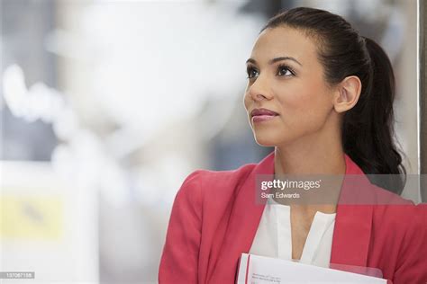 Pensive Businesswoman Looking Up High Res Stock Photo Getty Images