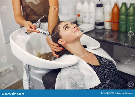 Woman Washing Head In A Hairsalon Stock Photo Image Of Caucasian