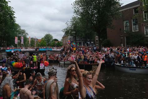 lgbt pride parade in amsterdam features boats as floats