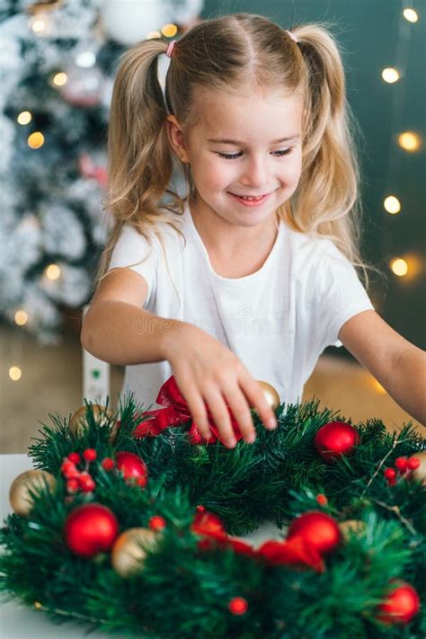 Preschooler Kid With Decorative Christmas Tree On Background Little
