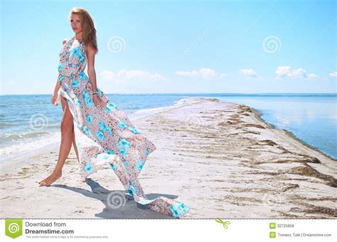 Woman In A Blue Dress On The Sea Coast Stock Photo Image Of Female