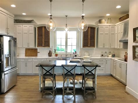 I had no clue what i was doing, but i knew what i was wanting. Our kitchen with White x White island, X counter stools ...