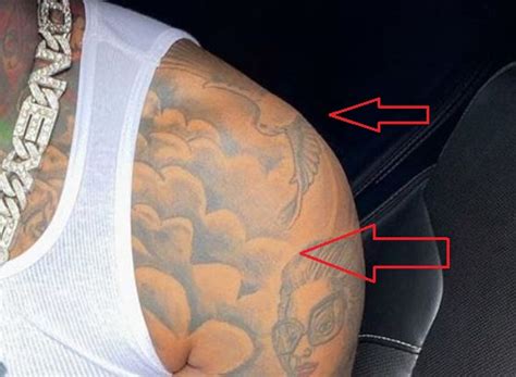 The unacceptable face of capitalism. Moneybagg Yo's 33 Tattoos & Their Meanings - Body Art Guru