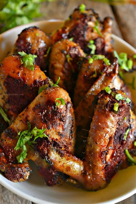 In a large bowl, whisk together oil, soy sauce, honey, chili garlic sauce, lime juice, garlic, and ginger. Brandy Marinated Grilled Chicken Wings