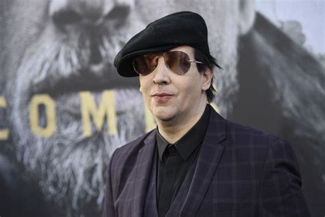 Marilyn Manson Tour On Hold After Giant Gun Prop Topples On Him During