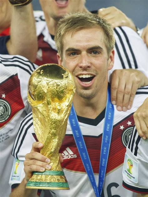 Philipp Lahm With The 2014 Fifa World Cup That Germany Won In The Final