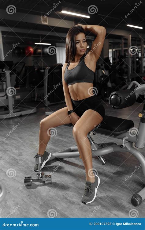 Hot Sporty Caucasian Woman Posing In Gym After Exercising With Dumbbell Stock Image Image Of