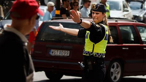 Swedish Police Officer Directs Traffic In Stockholm 2014 [1024 X 576] R Policeporn