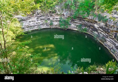 Cenote Sagrado Sacred Sinkhole In Chichen Itza At Yucatan Mexico Stock