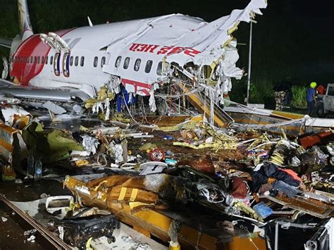 Pictures Dubai Kerala Air India Express Flight Crashes Splits Into