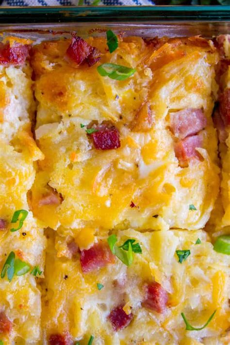 This egg sausage hash brown casserole overnight is my family's favorite dish. Cheesy Overnight Hashbrown Breakfast Casserole - The Food Charlatan