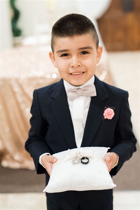Ring Bearer Holding The Bride And Grooms Rings Arizona Wedding