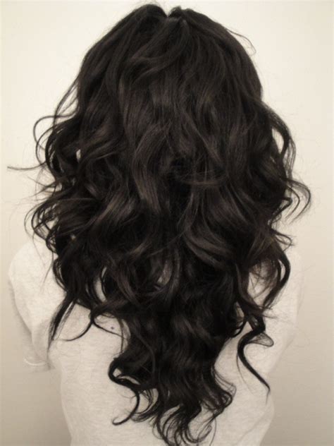 For curly hair that almost always means long layers. Long-Curly-Hair-v-shape-hair-cut - Women Hairstyles