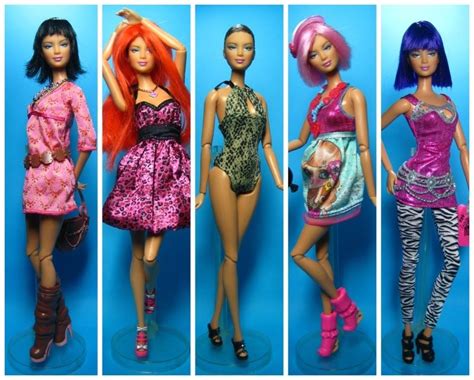 Barbie Dolls Are Lined Up In Different Outfits