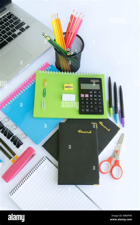 Multiple Stationery Items For Office And School And A Laptop Stock