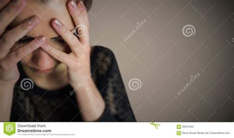 Woman Hands Over Face Against Brown Background Stock Illustration