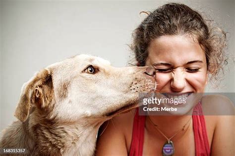 Dog Licking Woman Photos Et Images De Collection Getty Images
