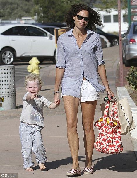 Minnie Driver And Her Curly Cutie Henry Swing Into Action At The Park Daily Mail Online