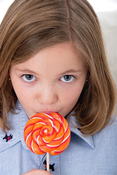 Girl Licking A Lollypop Photograph By Lea Paterson Pixels