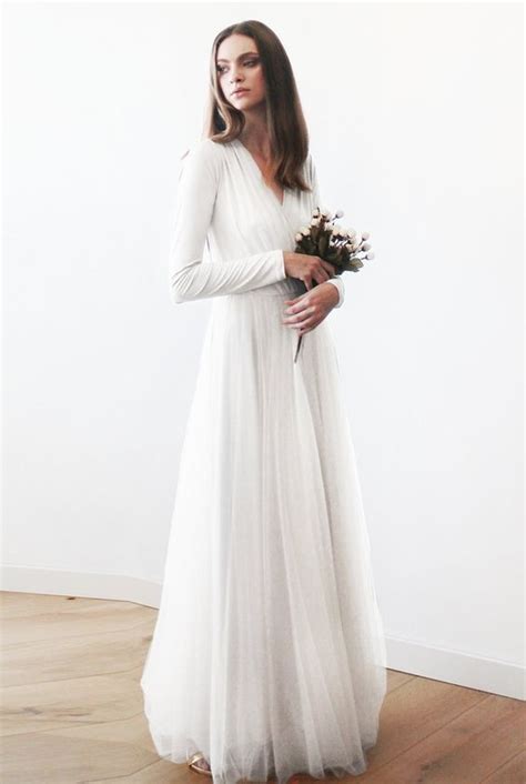 It's traditional, but has a low cut and a tie at the back of the neck give it a bit of extra. Long Sleeve Wedding Dress Ideas - Dresses and Fashion Blog