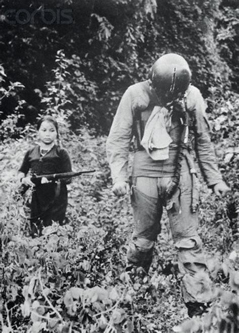 Us Air Force First Lieutenant Being Held Captive By A Young North Vietnamese Girl Vietnam War